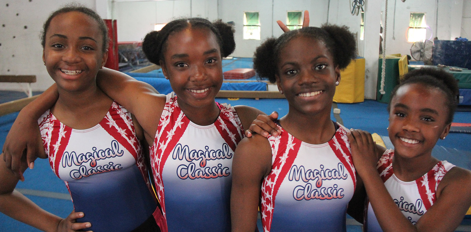 Young gymnasts in competition leotards in The Bahamas